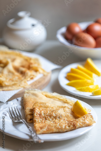 Traditional English pancakes with lemon and sugar for Shrove Tuesday/Pancake Day celebration