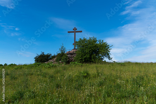 Cross of Worship on the Sacred Hill of the Unity of Russia on a sunny summer day, Izborsk, Pskov region, Pechersk district, Russia photo