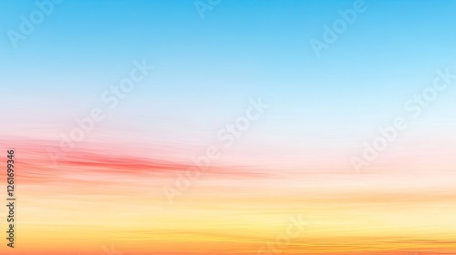 Serene sunset sky with vibrant colors transitioning from blue to orange and pink hues
