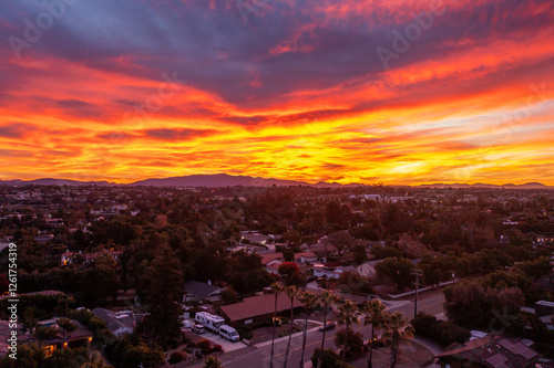 Vibrant sunrise over homes in Chula Vista, California. 