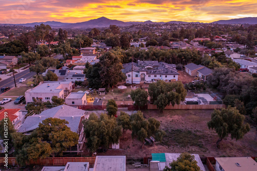 Vibrant sunrise over homes in Chula Vista, California.  photo