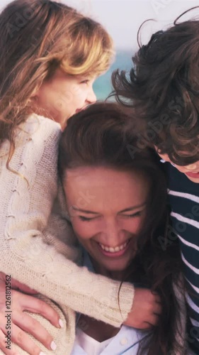 Young smiling mother with her children photo