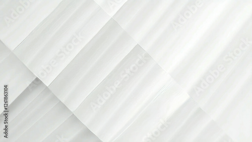 Abstract geometric pattern of overlapping white and light gray shapes.