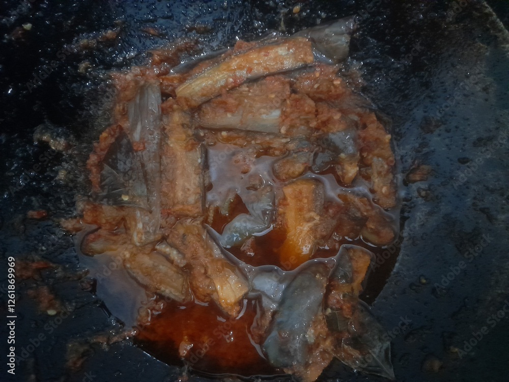 sauteed balado eggplant in a frying pan. background concept of traditional food, food recipe, breakfast, lunch, dinner, dish, meal, cuisine, ingredient, lifestyle, vegetable, vegetarian, culinary sauteed balado eggplant in a frying pan. background concept of traditional food, food recipe, breakfast, lunch, dinner, dish, meal, cuisine, ingredient, lifestyle, vegetable, vegetarian, culinary