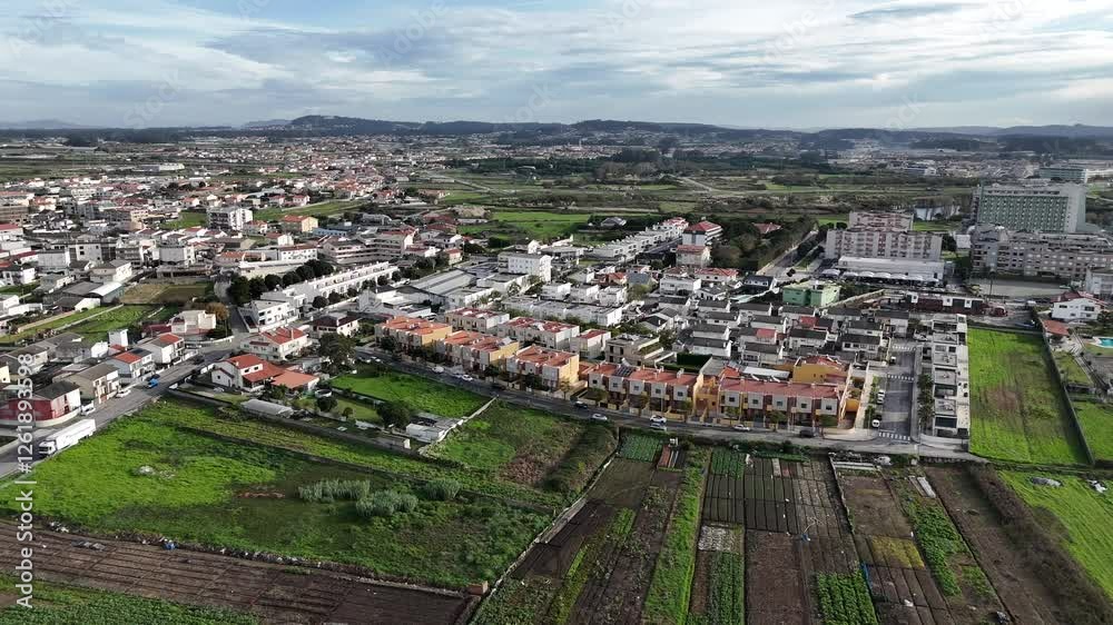 Aerial - agricultural fields and residential buildings in Póvoa de Varzim, Portugal Aerial - agricultural fields and residential buildings in Póvoa de Varzim, Portugal