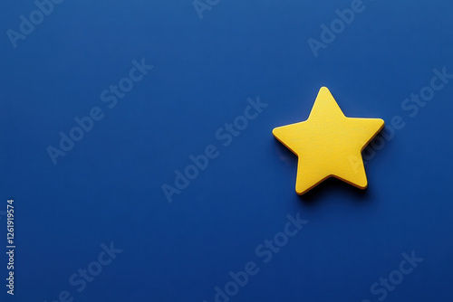 Yellow star shape on a solid blue background, creating a striking contrast and simplistic abstract design.