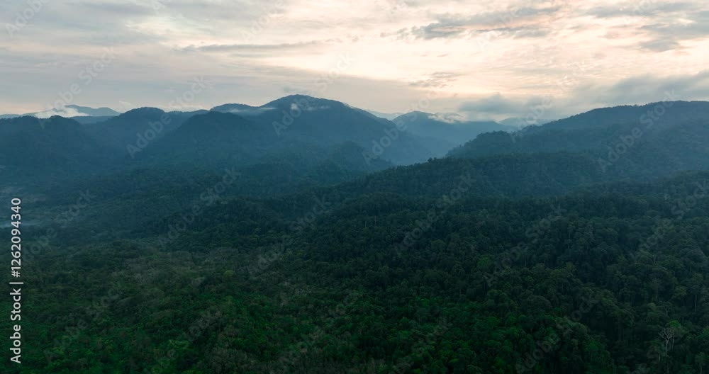 Mountains and hills with jungle at sunset. Bukit Lawang. Sumatra, Indonesia. Mountains and hills with jungle at sunset. Bukit Lawang. Sumatra, Indonesia.