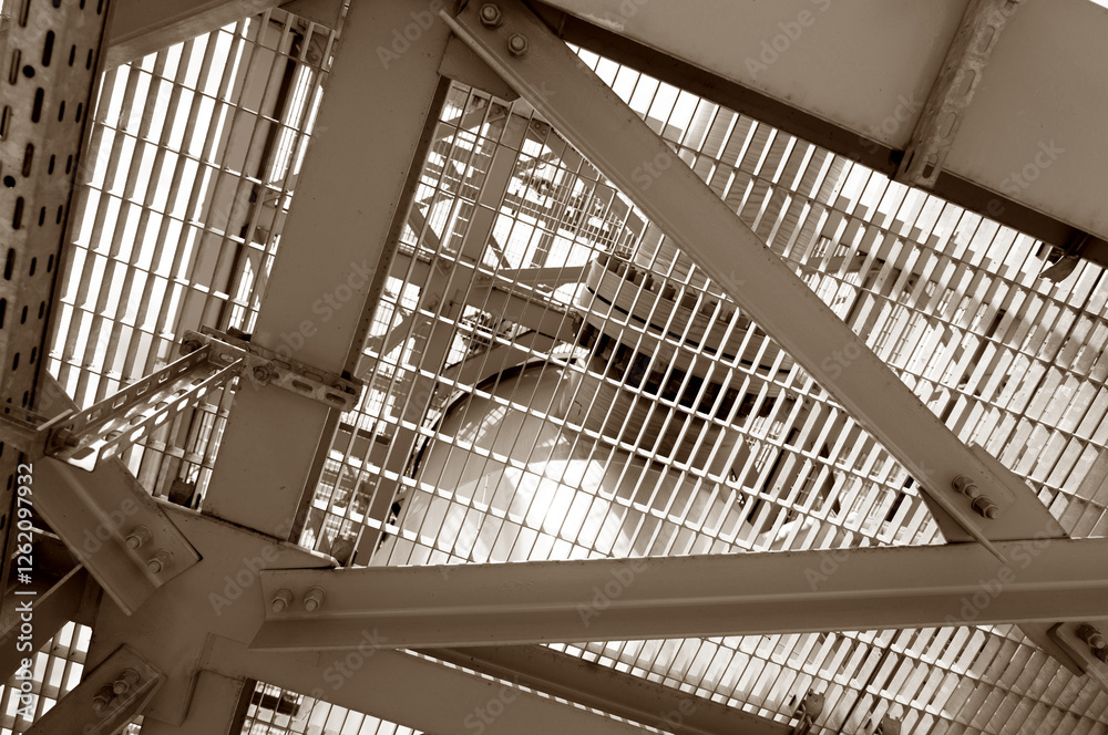 Obraz premium Close-up view of a durable industrial metal grid structure showcasing functional engineering design