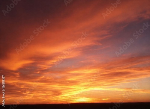 Fiery Sunset Sky with Dramatic Orange Hues
