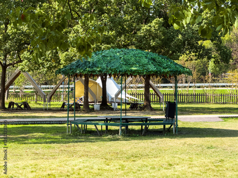 Tranquil Park Shelter Surrounded by Lush Greenery for Relaxation Tranquil Park Shelter Surrounded by Lush Greenery for Relaxation