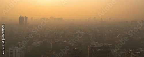 City skyline enveloped in dense smog at sunset