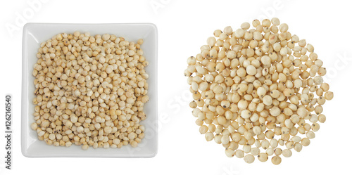 Sorghum seeds in ceramic bowl isolated on white background. Top view. Flat lay.
