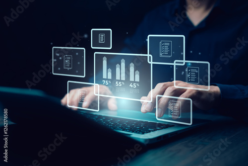 Business data analytics concept. A person working on a laptop with digital graphs, charts, and document icons floating on a virtual interface, representing big data, financial analysis.