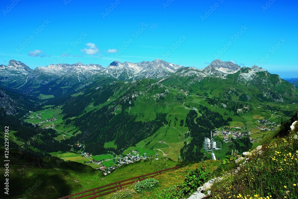 Fototapeta premium Austrian Alps - view from the cable car station on the top of Rüfikop to the town of Lech in the Lechtal Alps