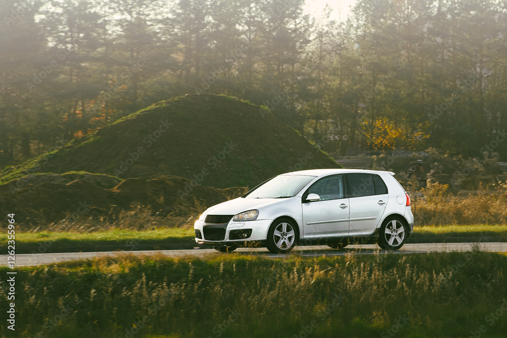 Vehicle driving through scenic countryside route Vehicle driving through scenic countryside route