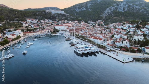 Aerial: Flying over Hvar island in Croatia. Shot in Mediterranean coastline.