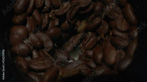 An Inside View of a Dark Shore Featuring Pebbles, Soft Sand, and Natures Serenity