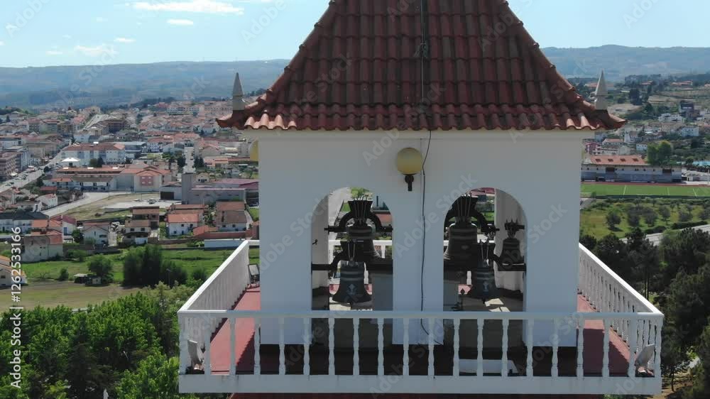 Valpacos landscape, Portugal. Drone flying around bell tower of Sanctuary of Nossa Senhora da Saude, shrine Our Lady of Health. Aerial orbiting