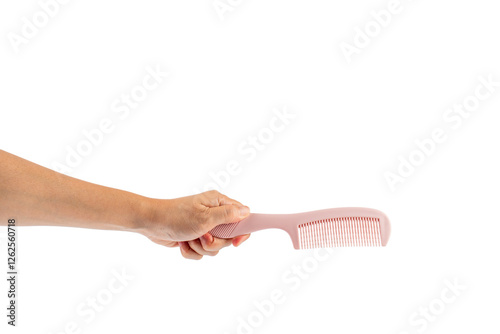 Hand and hair comb isolated on transparent background photo