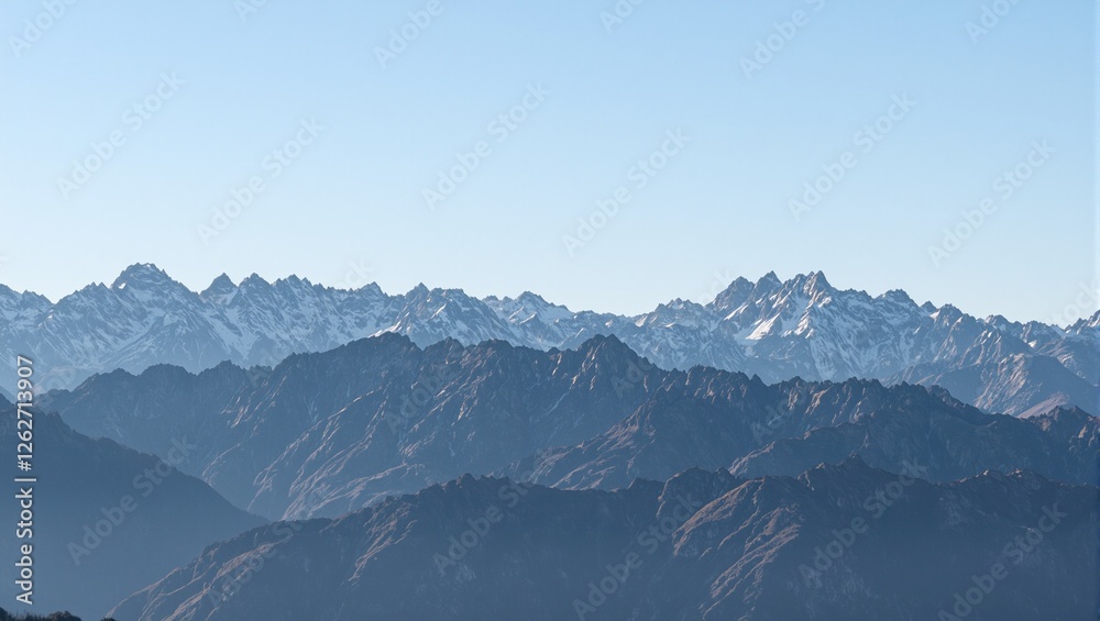 Fototapeta premium Serene sunrise over majestic mountain range bathed in golden light perfect for inspirational concepts