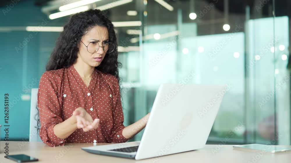 Worried businesswoman having problems with software or service on laptop computer sitting at workplace in business office. Frustrated disappointed female worker complains about bad internet connection Worried businesswoman having problems with software or service on laptop computer sitting at workplace in business office. Frustrated disappointed female worker complains about bad internet connection