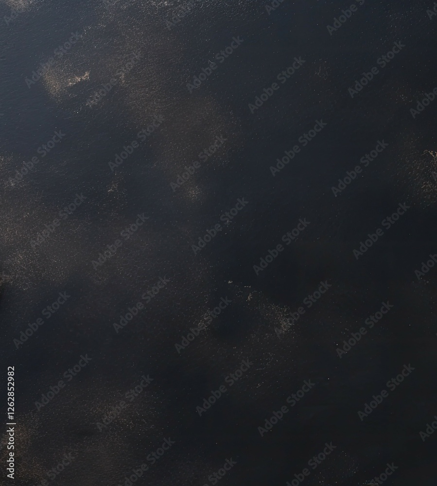 Fototapeta premium Space for text from above A black background