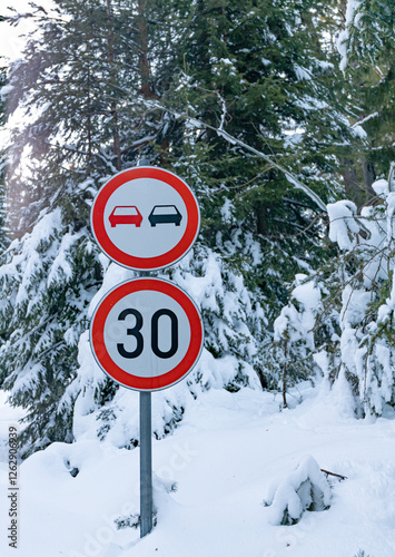 road sign in snow. speed limit in a mountainous area