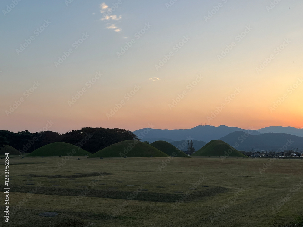 Sunset at Daereungwon Tomb Complex in Gyeongju,