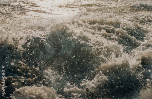 Close up of the breaking sea waves in the Pacific Ocean of Mexico