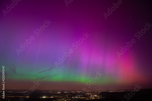 Starke Polarlichter über Deutschland. Am 10.05.2004 aufgenommen. Grandioser Ausblick vom Breitenstein bei Ochsenwang auf der Schwäbischen Alb. Blick Richtung Limburg, Weilheim, drei Kaiserberge. photo