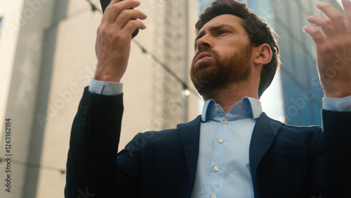 Foto Confused stressed irritated adult Caucasian businessman employer 40s male trying