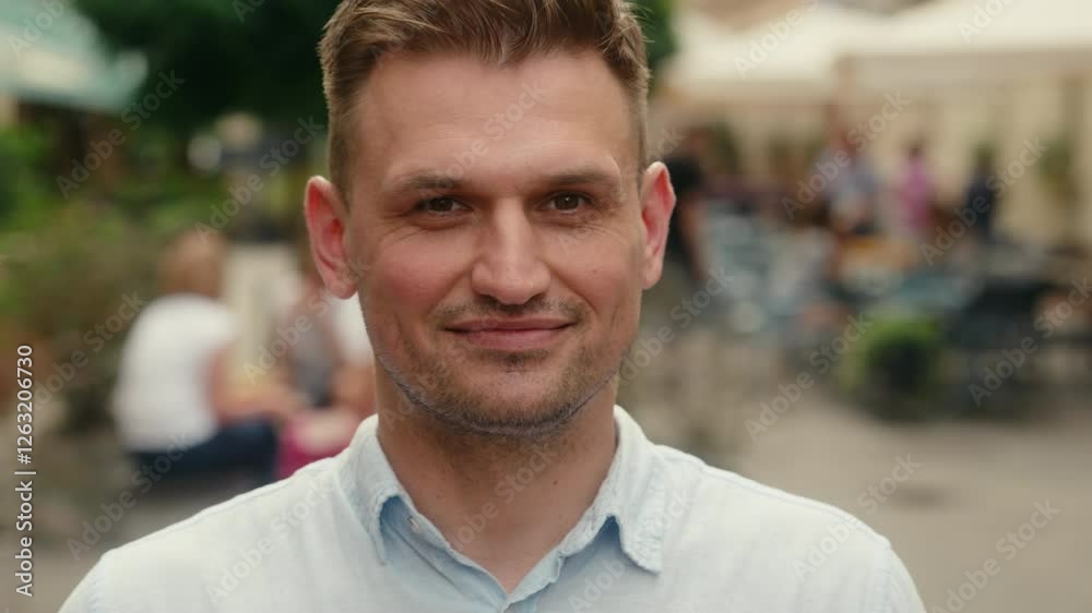 Close up portrait smiling positive guy Caucasian man tourist traveler summer holidays in city male businessman outside street 30s shopper smile looking at camera flirty wink one eye flirting outdoors Close up portrait smiling positive guy Caucasian man tourist traveler summer holidays in city male businessman outside street 30s shopper smile looking at camera flirty wink one eye flirting outdoors
