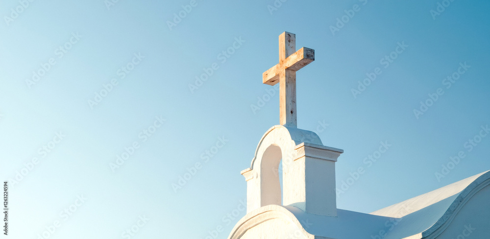 rustic wooden atop a white bell tower against a clear blue sky rustic wooden atop a white bell tower against a clear blue sky