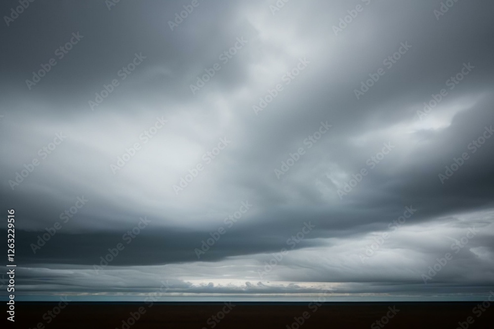 Dramatic sky with storm clouds before rain. Panoramic view of the stormy sky and dark clouds. Concept on the theme of weather, natural disasters, typhoon. Dramatic sky with storm clouds before rain. Panoramic view of the stormy sky and dark clouds. Concept on the theme of weather, natural disasters, typhoon.