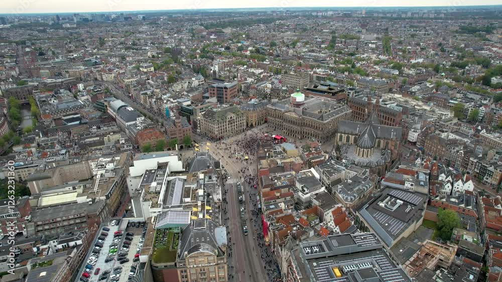 Stunning aerial footage of Koninklijk Paleis - the royal palace in Amsterdam showcasing its iconic architecture, and vibrant cityscape. 