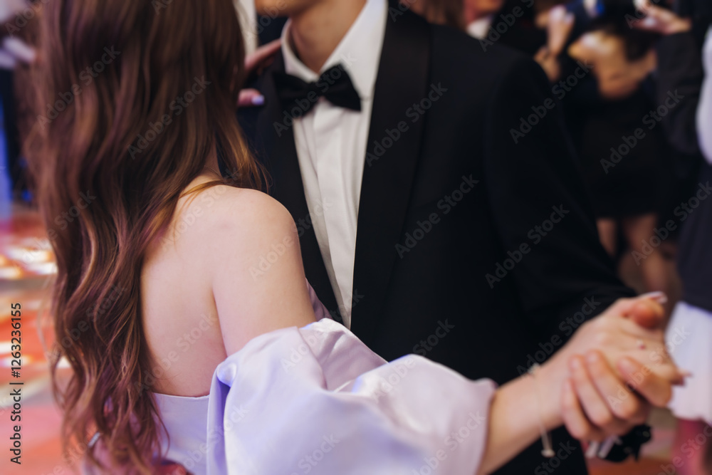 Naklejka premium High school graduates dancing on prom, waltz and classical ball slow dance in dresses and suits on school graduation party, boys and girls ballroom dancers, couples dance quadrille and polonaise