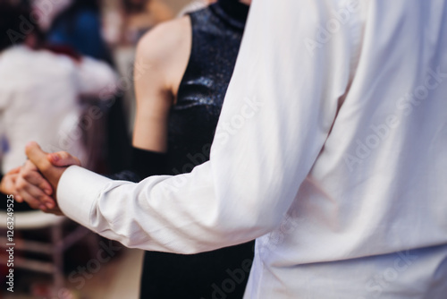 High school graduates dancing on prom, waltz and classical ball slow dance in dresses and suits on school graduation party, boys and girls ballroom dancers, couples dance quadrille and polonaise