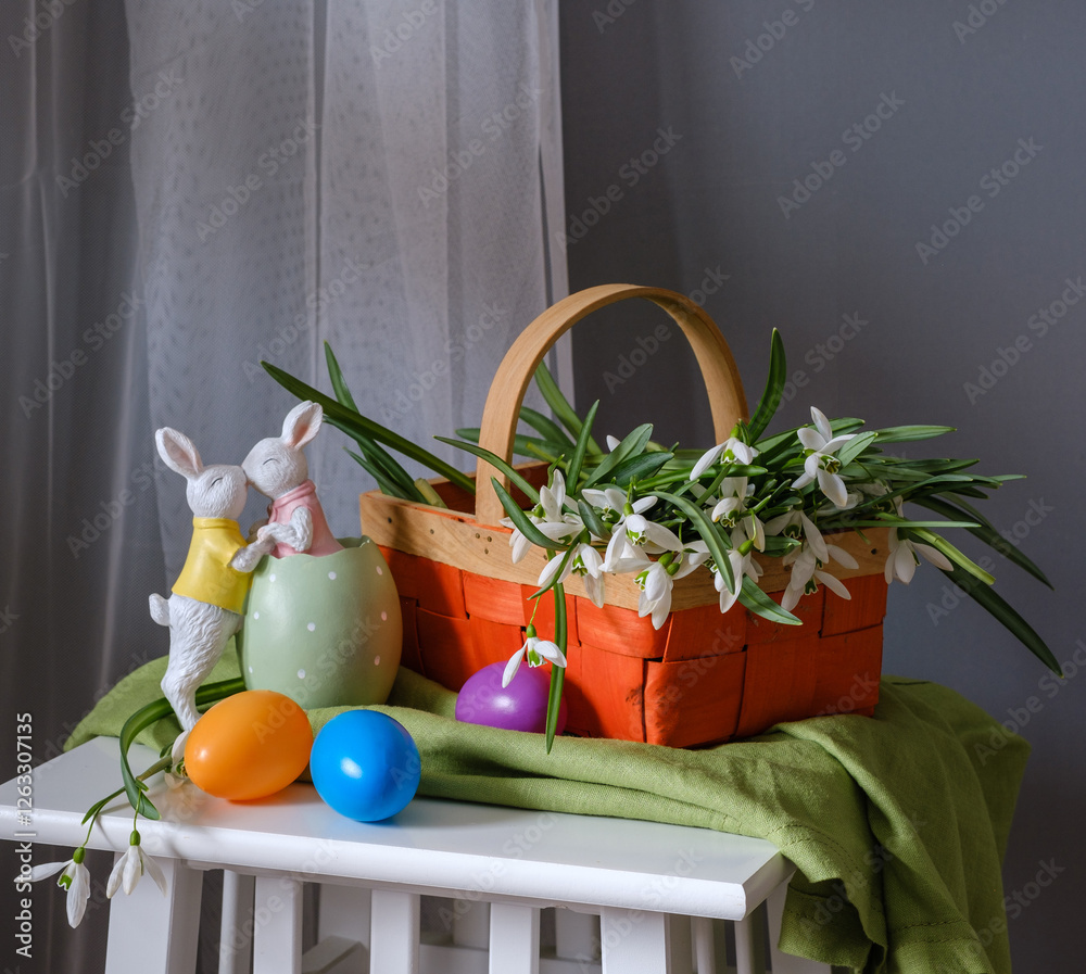 A Vibrantly Colorful Easter Basket Filled with Beautiful Flowers and Decorative Eggs
