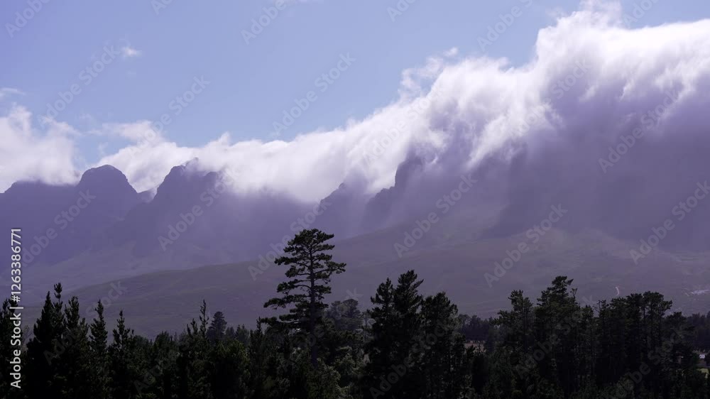background of fast moving clouds over mountains in Cape Town South Africa time lapse shooting