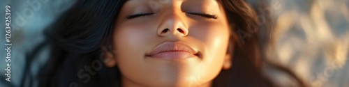Close-up portrait of a woman with her eyes shut