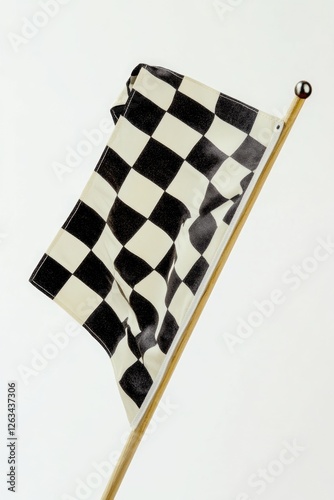 A simple black and white checkered flag on a stick, perfect for racing or competition theme images photo