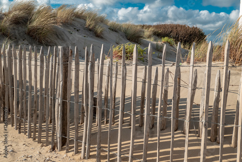 wooden fense at the beach way to the sea