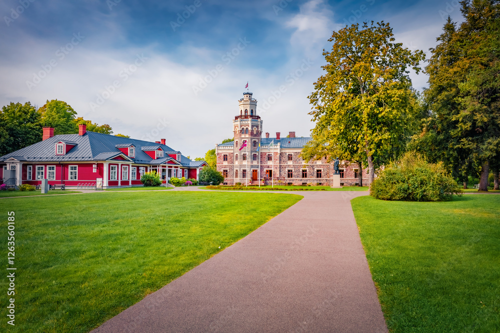 Attractive morning view of Sigulda New Castle with green meadow and empty tourist path. Magnificent summer cityscape Sigulda town, Siguldas novads, Latvia, Europe. Traveling concept background.