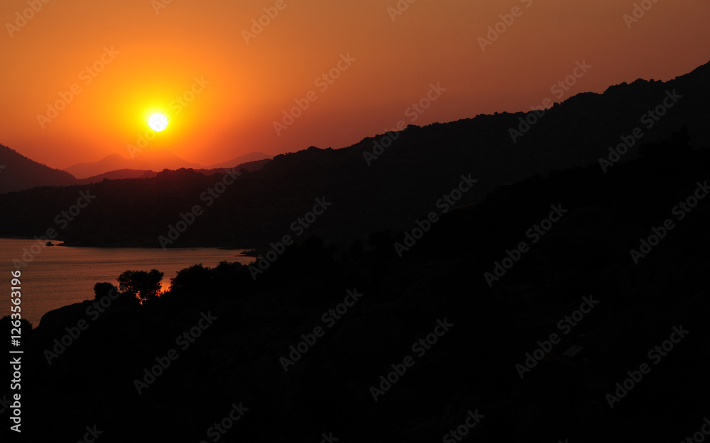 Obraz premium A sunset view from Kapikiri Village and Bafa Lake in Mugla, Turkey