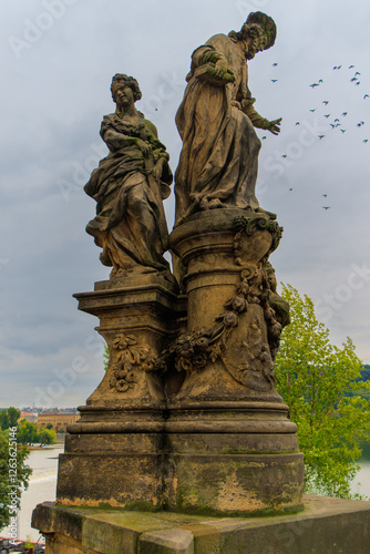 Prague, Czech Republic. Charles bridge. Sculpture St. Ivo in Femida's society. photo