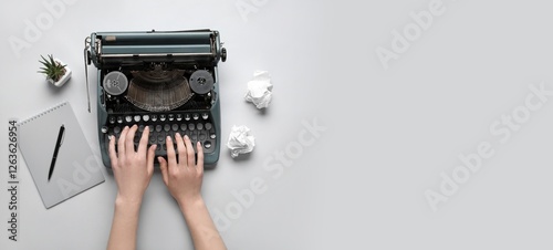 Hands of woman using typewr...