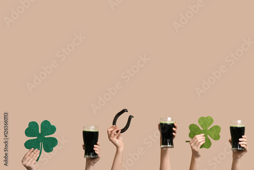 Many hands with beer and de...