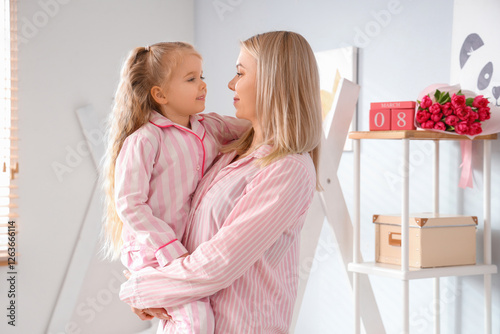 Little girl with her mother...