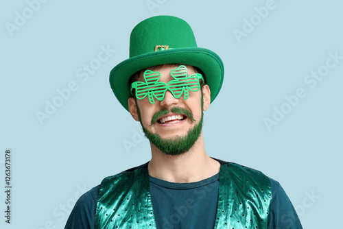 Smiling man in green leprec...