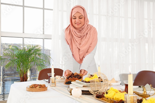 Mature Muslim woman setting...